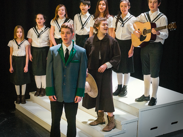 Students performing in musical production