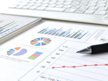 Business chart and pen with no person